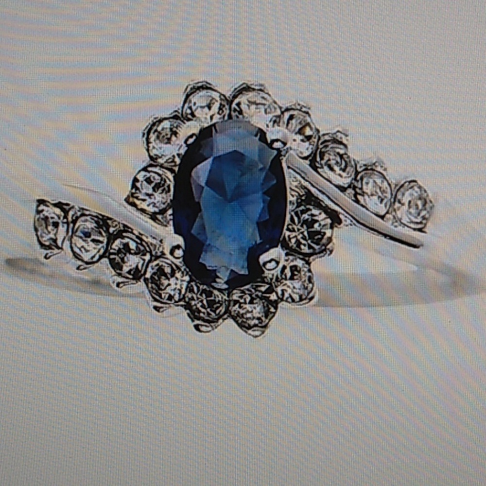 Elegant Silver and Blue Gemstone Ring